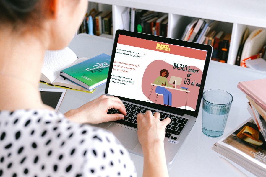 A woman using the Rise Workplace Wellbeing e-learning portal